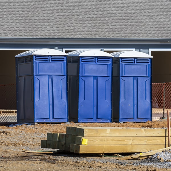 what is the cost difference between standard and deluxe porta potty rentals in Portland Indiana
